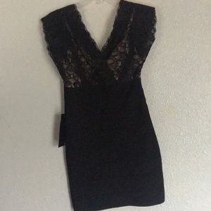 Bebe Size: Medium lace bandage dress